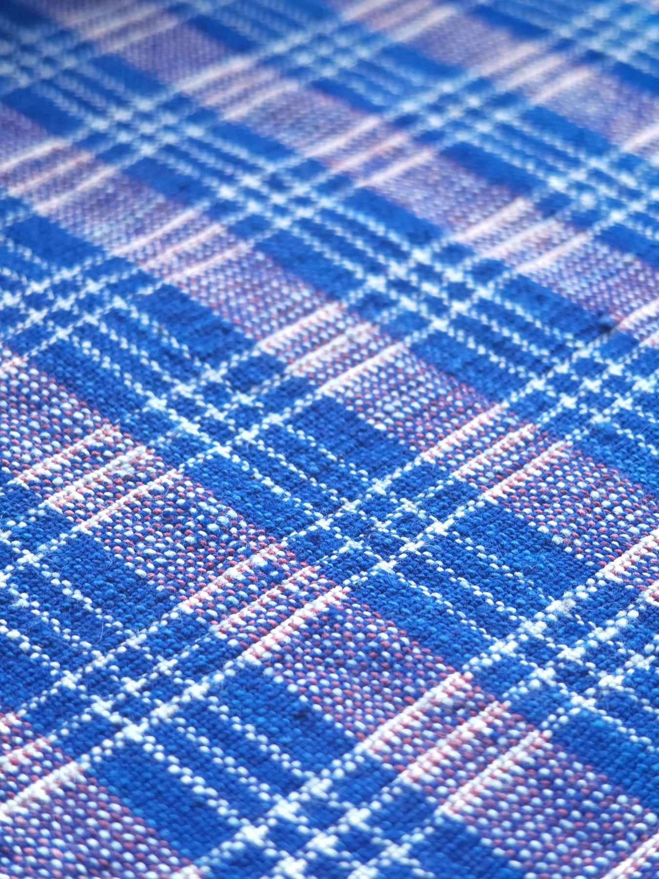 Indigo Osmanthus Lattice — source photograph 3, documenting the same textile.